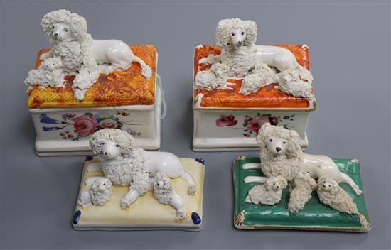 A Staffordshire porcelain poodle and puppies inkbox, a similar box and cover and two covers, c.1840-50, approx 9cm wide